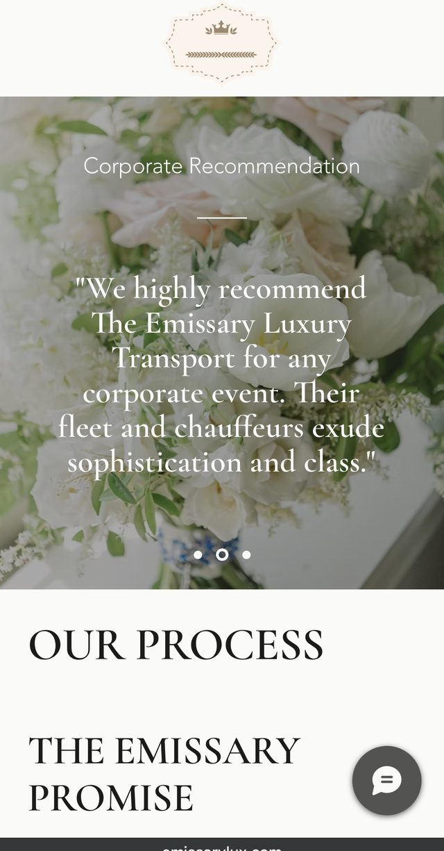 The Emissary Luxury Transport website on a phone
